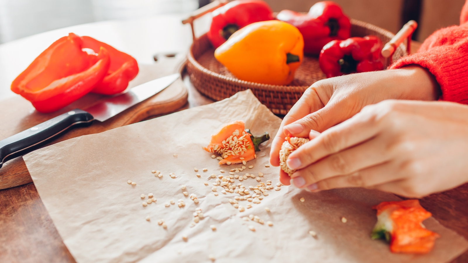 we've mastered germinating chile pepper seeds. here's how 5 close-up of collecting ovules from fruit, placing them on a brown paper towel, all placed on top of a wooden surface in a kitchen area