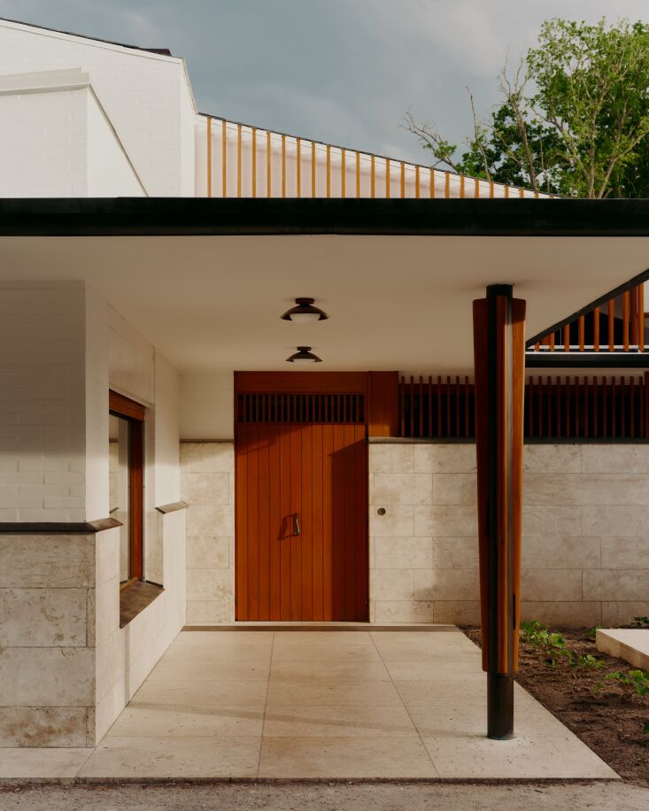 the exterior is constructed with white finished brick and the same local sandst 18