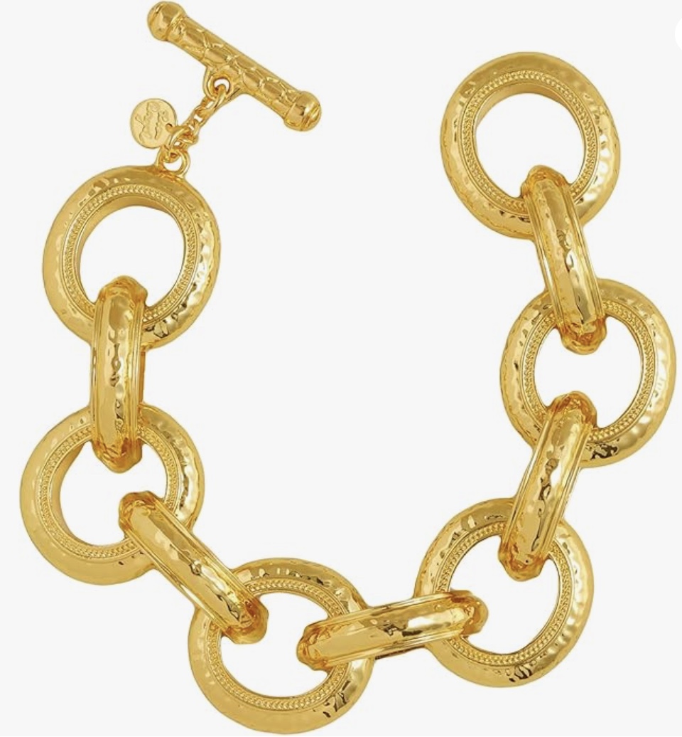 11 things i wish i bought sooner (april edition) 4 a gold bracelet with large, round interlocking links and a toggle clasp, displayed on a white background.