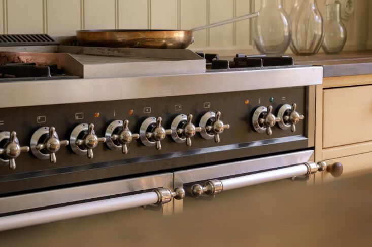 the range is a traditional ilve majestic oven. 21