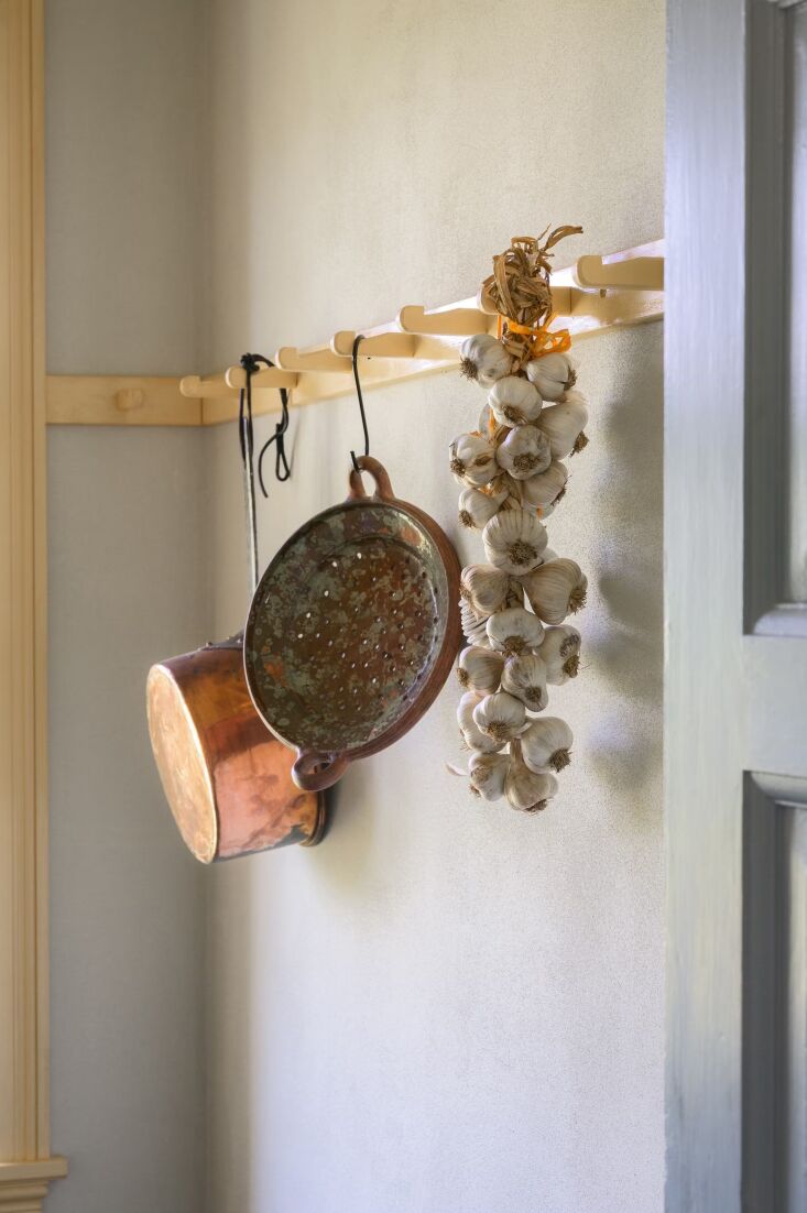 original peg rails were painted in the same shade of yellow. 23