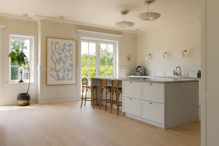 the cabinetry was designed custom by sarah fitzgerald for the space. the ceilin 18