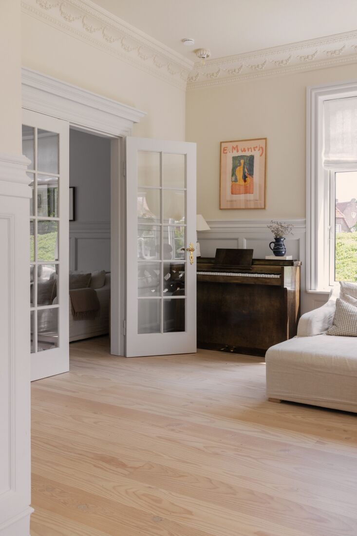 a quiet living space on the second floor is home to the family