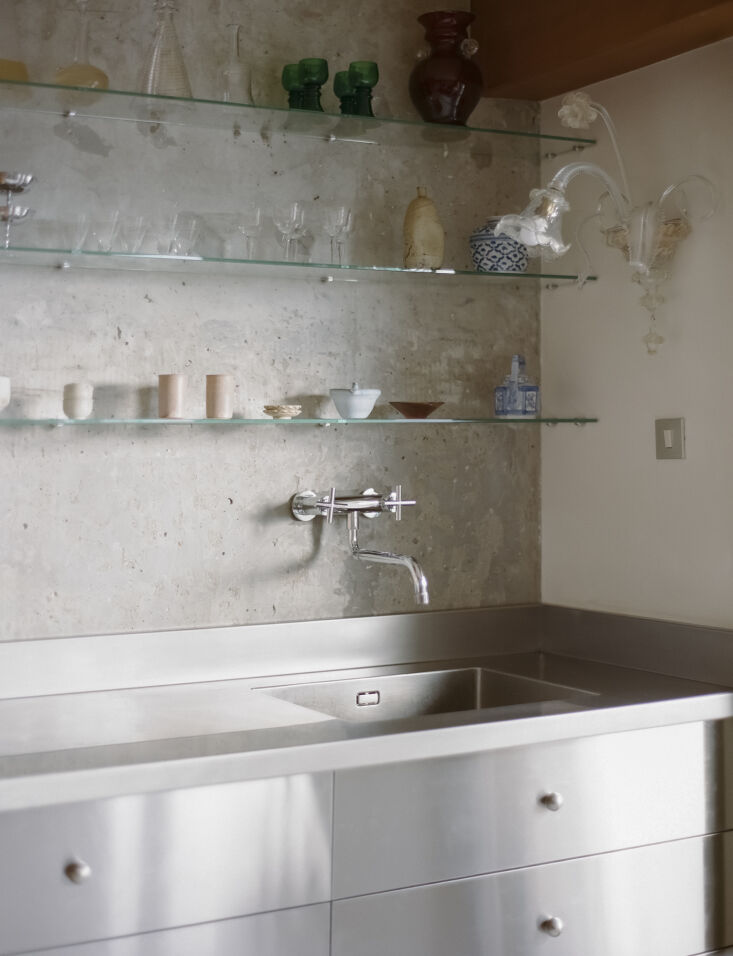 the wall lamp is a vintage murano glass sconce. 21