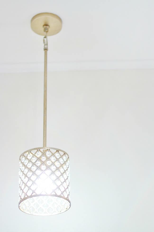 these small lights hang over each vanity.