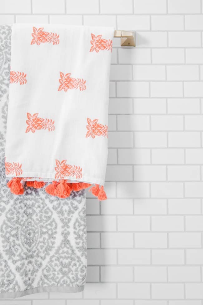 i introduced accent colors in the shower curtain and towels.