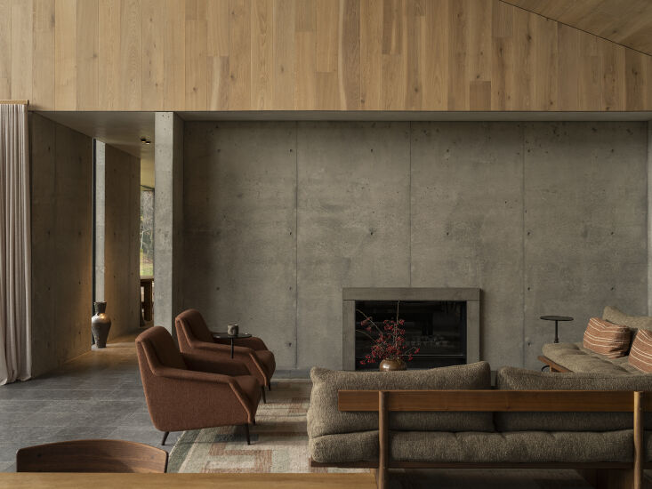the living room is anchored with concrete and limestone, then warmed with oak p 19