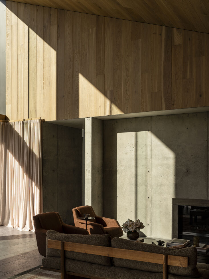the armchairs are the cdc1 lounge chair by carlo de carli for gubi. the side t 20