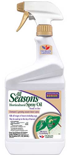 a close up of a spray bottle of bonide horticultural spray pictured on a white background.