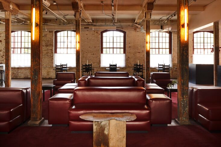 the red leather sofas in the lounge were designed by charlap hyman and herrero. 19