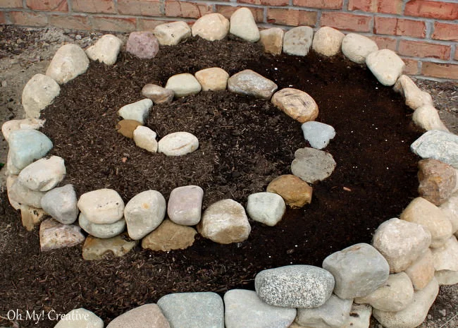 vegetable garden spiral made with stacked rocks