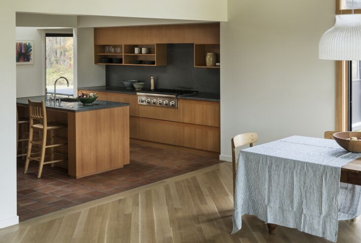 the 1980s renovation and additional wings had kind of pinned the kitchen into  21
